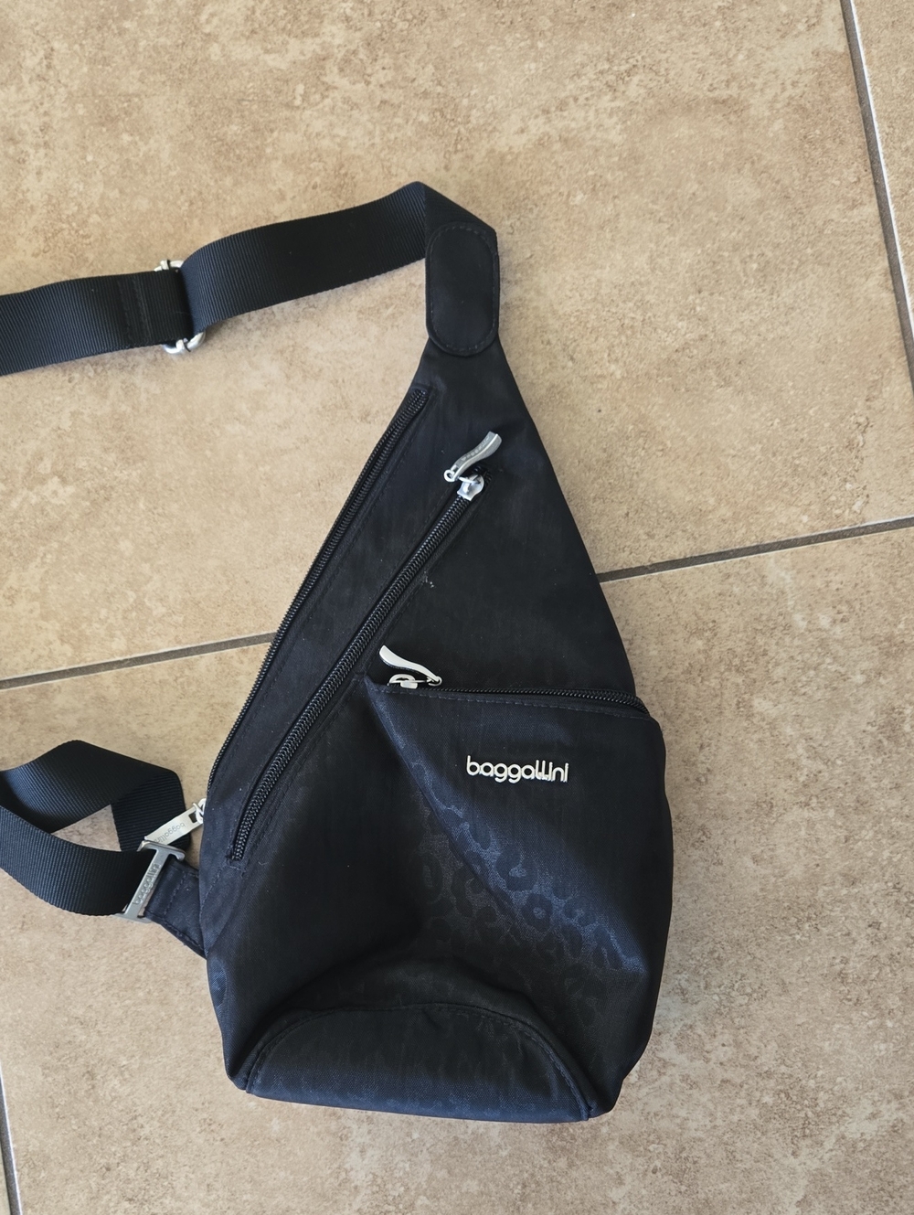 Baggallini Black Sling Crossbody Bag with Subtle Pattern